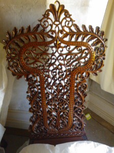 An intricately carved chair back